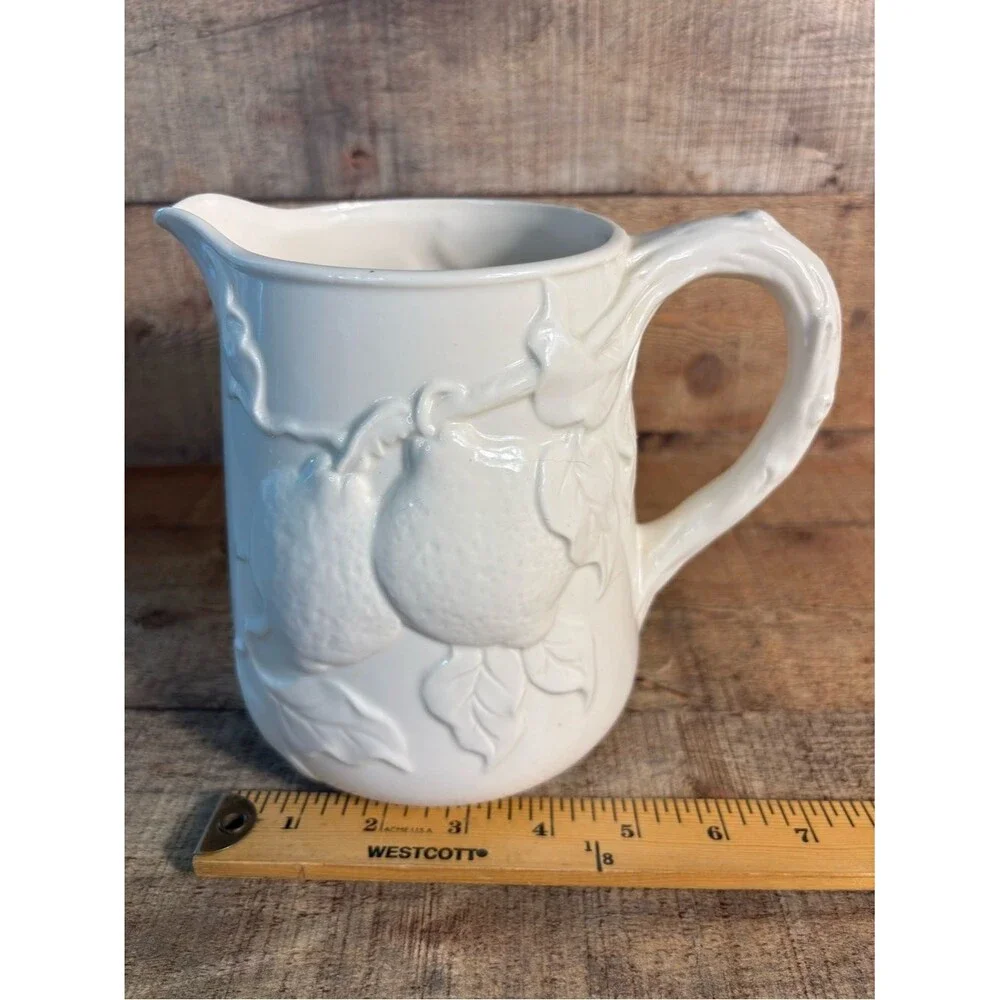Peppertree Tabletops Pitcher Ivory Ceramic Pottery Embossed Fruit Design 6-3/4